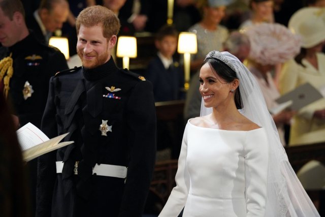 Britský princ Harry a americká herečka Meghan Markleová si řekli ano na královském hradě Windsor.  (ČTK)