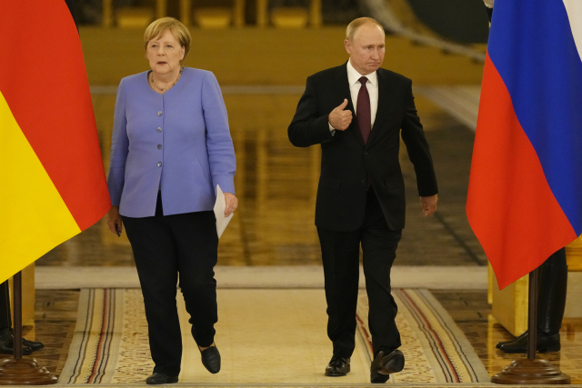 Bývalá německá kancléřka Angela Merkel na návštěvě u ruského prezidenta Vladimira Putina v Moskvě (20. 8. 2021) (ČTK/AP/Alexander Zemlianichenko)