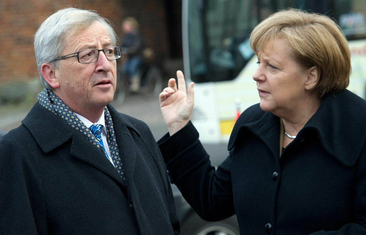 Předseda Evropské komise Jean-Claude Juncker s německou kancléřkou Angelou Merkelovou.